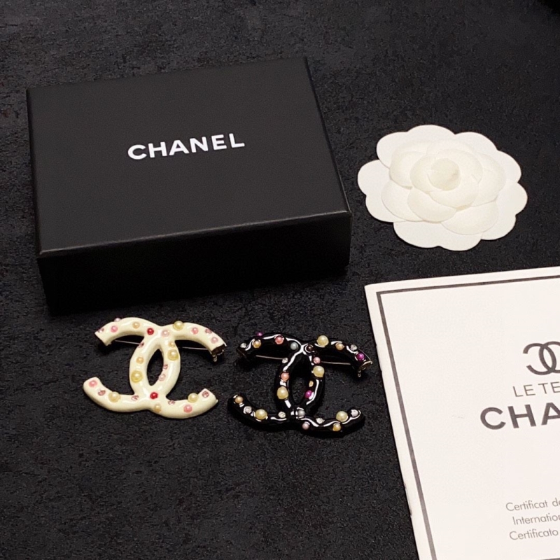 Ch**el brooches